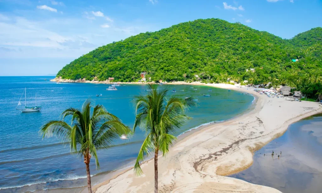 Yelapa beach and village along the green coastline